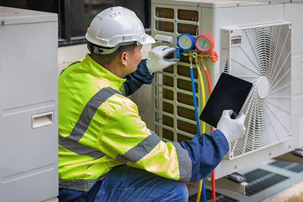 Professional Hvac technician working in Bat Cave, NC
